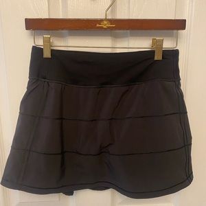 Pace Rival athletic skirt. Size 4. Excellent condition. compression shorts under